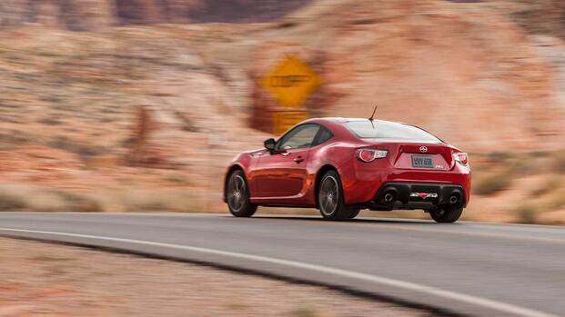 2013 Scion FR-S Red Rear Angled View Driving