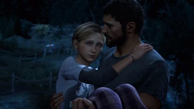 Joel holding his daughter in The Last of Us