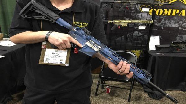Battle Rifle Company production manager Karl Sorken displays the BR4 Cutlass maritime defense rifle.
