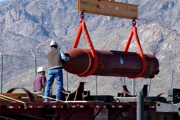 A Massive Ordnance Penetrator (MOP) bomb is loaded onto a truck. Its explosive yield is about a third of the MOAB that was dropped on an ISIS tunnel complex in Afghanistan. But the MOP can penetrate concrete-hardened targets before detonating. (DoD photo)
