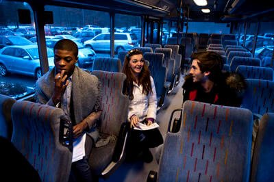 Military kids on a bus