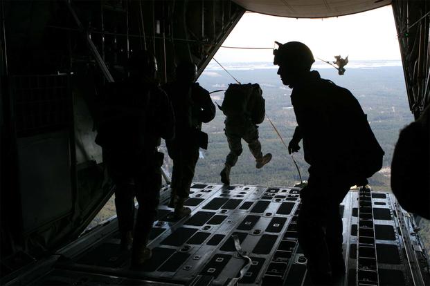 FILE -- Marines with U.S. Marine Corps Forces, Special  Operations Command jump from a C-130 during parachute exercise aboard Camp Lejeune, N.C., Dec. 15, 2010. (U.S. Marine Corps/Lance Cpl. Kyle McNally)