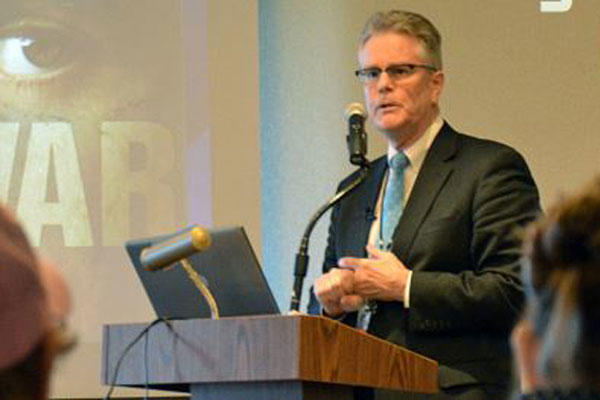 Dr. Terence Keane is shown in this 2012 VA photo speaking on the therapeutic value of the arts and literature in treating post-traumatic stress disorder.(Photo: Department of Veterans Affairs)