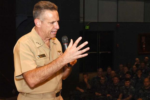 FILE - Chief of Naval Personnel, Vice Adm. Robert Burke speaks at an all-hands with members of the submarine community in Groton, Conn. at Naval Submarine Base New London (U.S. Navy: Steve Owsley)