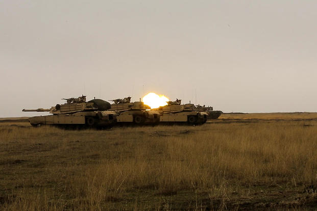 U.S., Romanian and Moldovan military members participate in a tank shoot rehearsal during Platinum Lynx 16-2 at Smardan Training Area, Romania, Dec. 9, 2015. (Photo: Lance Cpl. Melanye E. Martinez)