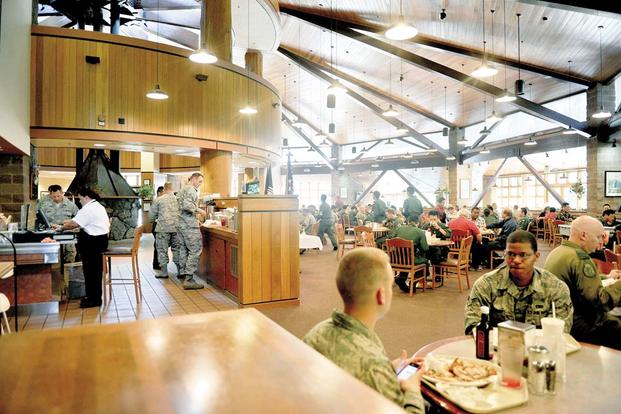 FILE PHOTO -- Patrons eat at a dining facility at Joint Base Elmendorf-Richardson. (U.S. Air Force photo/Airman 1st Class Jack Sanders)