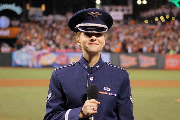 Airman 1st Class Michelle Doolittle performs God Bless America at the 2014 World Series. (Photo: U.S. Air Force/Staff Sgt. Megan May.)