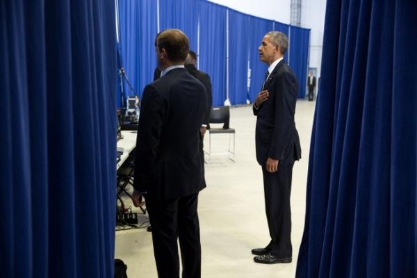 President Barack Obama listens to the National Anthem backstage before making remarks at MacDill Air Force Base in Tampa, Fla., Dec. 6, 2016. (Official White House Photo by Pete Souza)