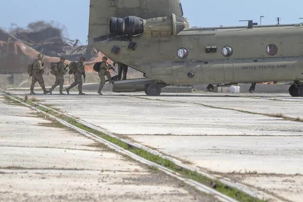 U.S. soldiers board a U.S. Army CH-47 Chinook helicopter in Hamam al-Alil, Iraq, Feb. 22, 2017. (U.S. Army photo/Jason Hull)