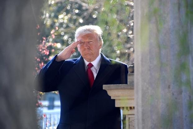 President Trump pays his respect at the grave site of former president Andrew Jackson on March 15, 2017, in Hermitage, Tenn. (Photo by Nicholas Atwood/Tennessee National Guard)