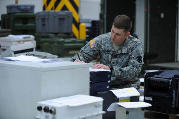 Soldier performing logistical work.