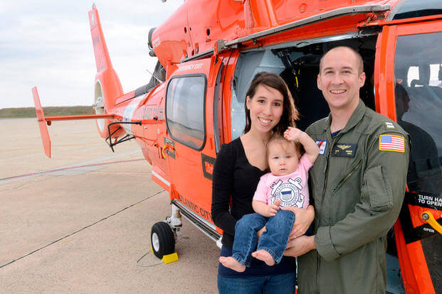 Lt. Nate Rhodes, a helicopter pilot with wife and daughter