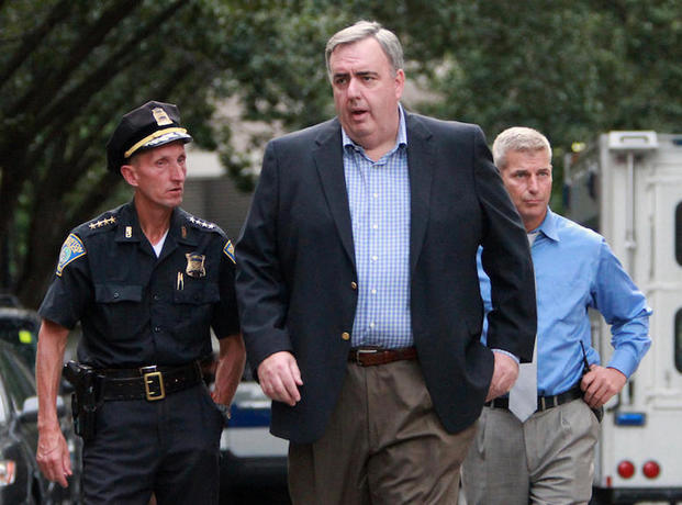 Boston, MA - Commissioner Edward Davis and Superintendent William Evans (L) on the scene where police were investigating the area where there was a police involved shooting of a man late Tuesday afternoon. Boston Herald staff photo by John Wilcox.