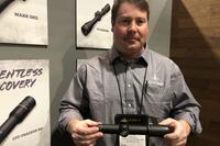 Leupold employee demos the company’s Mark 6 1-6X variable powered scope. (Hope Hodge Seck/Military.com)