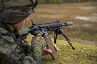 A member of 3rd Battalion, 8th Marines, fires the M27 Infantry Automatic Rifle during a live-fire weapons exercise on Camp Lejeune, N.C., on Dec. 8, 2017. (U.S. Marine Corps photo by Lance Cpl. Michaela R. Gregory)