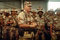 U.S. Army Gen. Norman H. Schwarzkopf, commander of U.S. Central Command, speaks to U.S. soldiers inside a hangar while visiting a base camp during Operation Desert Shield, April 1, 1992.(Defense Department)