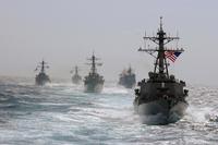 The guided missile destroyer USS Porte (right) leads the way during divisional tactics training along with the USS McFaul, USS Arleigh Burke and USS Cole, and the guided missile cruisers USS Cape St. George and USS Anzio in the Atlantic Ocean, on March 5, 2005. (U.S. Navy/ Lt. j.g. Caleb Swigart)