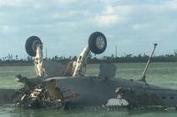 An F/A-18F Super Hornet lies upside down after crashing off the coast of Key West March 14, 2018. Photo courtesy Jack and Clay Lockamy.