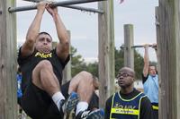 Spc. Efren Gandara performs leg tucks during a pilot for the Army Combat Fitness Test, a six-event assessment designed to reduce injuries and replace the current Army Physical Fitness Test. (U.S. Army/Sean Kimmons)