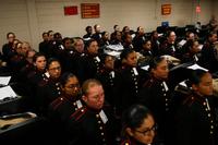 Recruits with Platoon 4040, Papa Company, 4th Recruit Training Battalion, try on their blue dress coats for the first time Aug. 21, 2018, on Parris Island S.C. (U.S. Marine Corps/Cpl. Vivien Alstad)