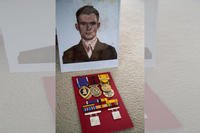 U.S. Marine Corps Sgt. Millard Odom’s Kilo Company, 3rd Battalion, 2nd Marines, 1st Marine Division, medals and badges on display in Vista, California, Oct. 17, 2018. Odom's remains were identified on Aug. 20, 2018. (U.S. Marine Corps photo by Lance Cpl. Noah Rudash)