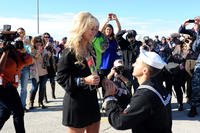 A sailor proposes at homecoming. (U.S. Navy)