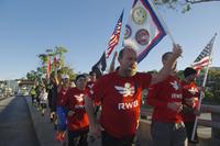 Active duty service members, veterans and their families run the streets of San Diego during a Team Red, White and Blue (RWB) hosted Veterans Day run. (U.S. Navy/Mass Communication Specialist 3rd Class Gerald Dudley Reynolds)