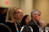 Then-Deputy Assistant Secretary of Defense for Community and Public Outreach Rene Bardorf listens as Secretary of Defense Chuck Hagel addresses audience members attending the Association of the United States Army conference in Washington, D.C., Oct. 15, 2014. (DoD photo/Adrian Cadiz)