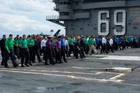 Sailors participate in a foreign object debris walk down on the flight deck aboard the aircraft carrier USS Dwight D. Eisenhower (CVN 69). Ike is underway in the Atlantic Ocean conducting carrier qualifications while in the basic phase of the Optimized Fleet Response Plan. (Kaleb Sarten/U.S. Navy)