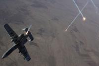 Countermeasures streak through the sky as an Air Force A-10 Thunderbolt II assigned to the 74th Expeditionary Fighter Squadron departs after refueling from a KC-135 Stratotanker over Syria on Dec. 1, 2017. Air Force photo by Staff Sgt. Paul Labbe