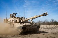 An Army Paladin M109A7 Artillery System assigned to Alpha Battery, 1st Battalion, 5th Field Artillery Regiment, 1st Armored Brigade Combat Team, out of Fort Riley, Kan. stationed in Toruń, Poland conducts maneuvers prior to artillery certifications, April 16, 2019. (U.S. Army photo/Jeremiah Woods)