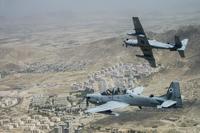 An Afghan Air Force A-29 Super Tucano soars over Kabul, Afghanistan, Aug. 14, 2015. (U.S. Air Force/Staff Sgt. Larry E. Reid Jr.)