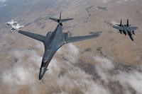 A U.S. Air Force B-1B Lancer bomber, an F-15E Strike Eagle and two Qatari Mirage 2000s fly in formation during Joint Air Defense Exercise 19-01 in Qatar on Feb. 19, 2019. (U.S. Air Force photo by Staff Sgt. Clayton Cupit)