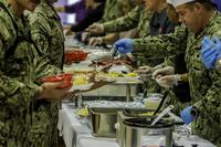 Sailors and students from the Naval Diving and Salvage Training Center feast on turkey and all the trimmings during a Thanksgiving dinner at Naval Support Activity Panama City, Fla., Nov.14, 2019. (U.S. Navy)