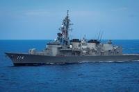 The Takanami-class destroyer JS Suzunami sails in formation.