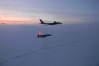 North American Aerospace Defense Command F-22s intercepted two Russian Tu-142 reconnaissance aircraft.