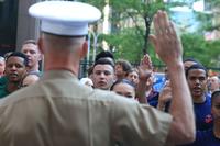 Brig. Gen. James Glynn officiates the Oath of Enlistment to future recruits.