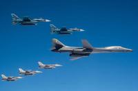 A U.S. Air Force B-1B Lancer and F-16 Fighting Falcons conducted bilateral joint training with JASDF F-2s.