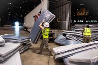 Illinois Air National Guard assemble equipment at the McCormick Place Convention Center.