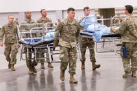 Texas Army National Guard troops set up a field hospital in response to COVID-19 in Dallas, Texas.