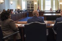 people testifying before a committee