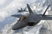 U.S. Air Force F-22 Raptors  fly in formation over the Joint Pacific Alaska Range Complex.