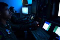 MQ-1 Predator sensor operator follows a moving target