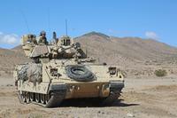 U.S. Army Soldiers  provide security around a local town at the National Training Center in Fort Irwin,