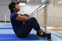 woman doing sit-ups