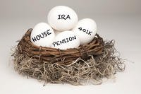 Eggs in a nest labeled with retirement savings plans indicating a nest egg of savings