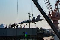 USS Theodore Roosevelt training drone.