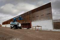 Construction crews erect levee wall system U.S. Border Patrol's Rio Grande Valley Sector.