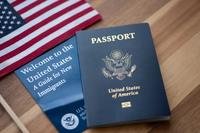 Passport and flag representing U.S. citizenship