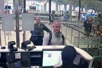 Michael L. Taylor and George-Antoine Zayek at passport control at Istanbul Airport.
